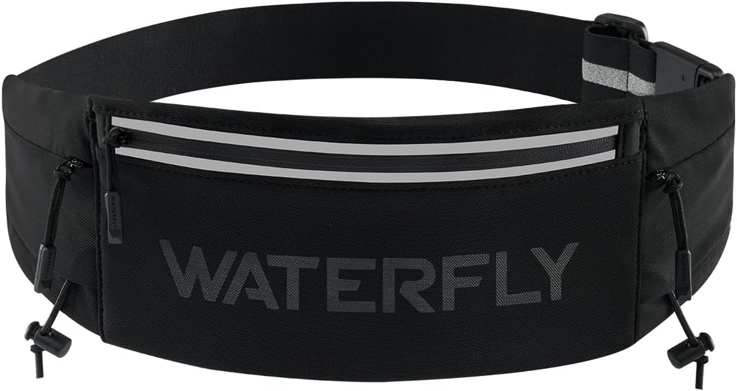 Woman wearing WATERFLY running belt fanny pack during outdoor marathon race