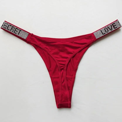 Pack of five cotton g-string thongs displayed by color variety