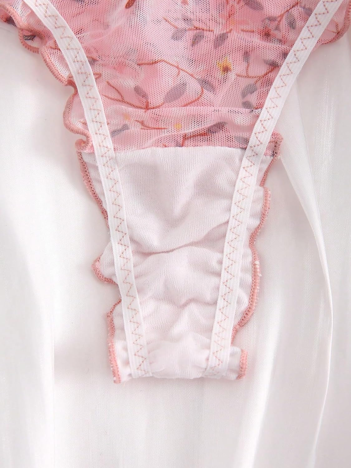 Woman wearing floral low rise thong panties comfortable fit demonstration