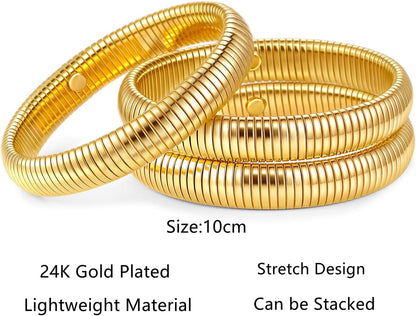 Three-piece chunky gold bangle collection showing stack styling