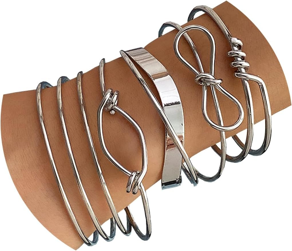 Detail view of textured 14K gold plated bangle bracelet charm