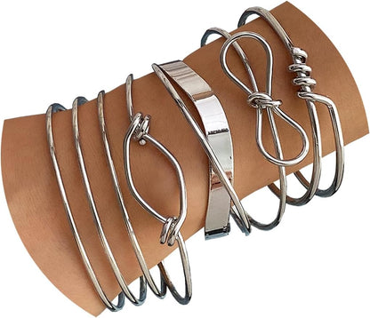 Detail view of textured 14K gold plated bangle bracelet charm