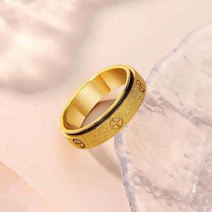 Cross fidget ring with three-dimensional design for smooth rotation