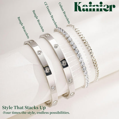 Mixed gold and silver bracelets stacked on woman's wrist together