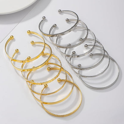 Stackable textured gold bangles jewelry set