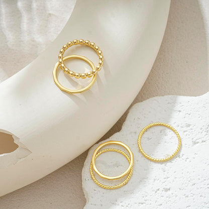 Fashion gold ring set featuring polished band designs