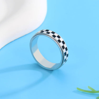 Fidget ring spinning motion demonstrated on woman's hand
