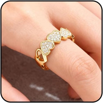 Gold heart ring with hollow cubic zirconia crystal design