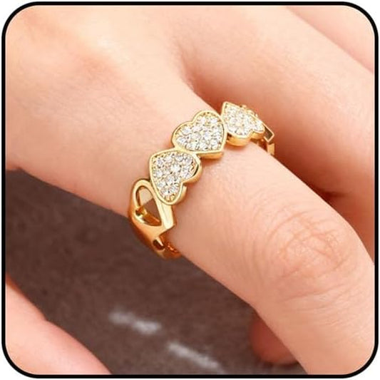 Gold heart ring with hollow cubic zirconia crystal design