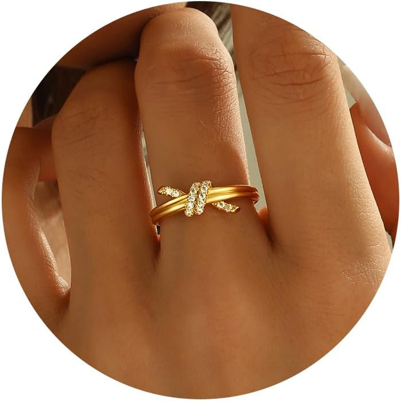 18K gold-plated diamond twist love knot ring on woman's hand