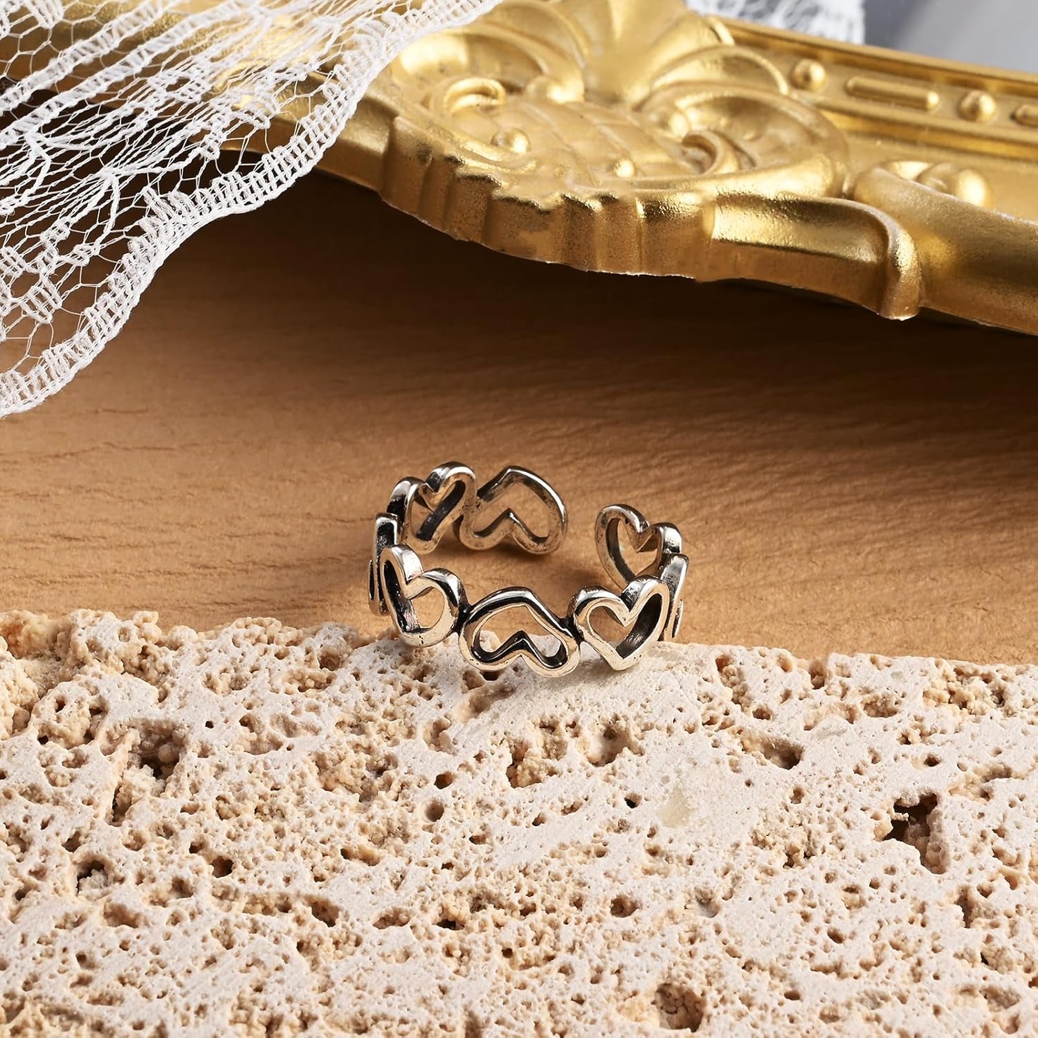 Side view of adjustable vintage silver heart ring band