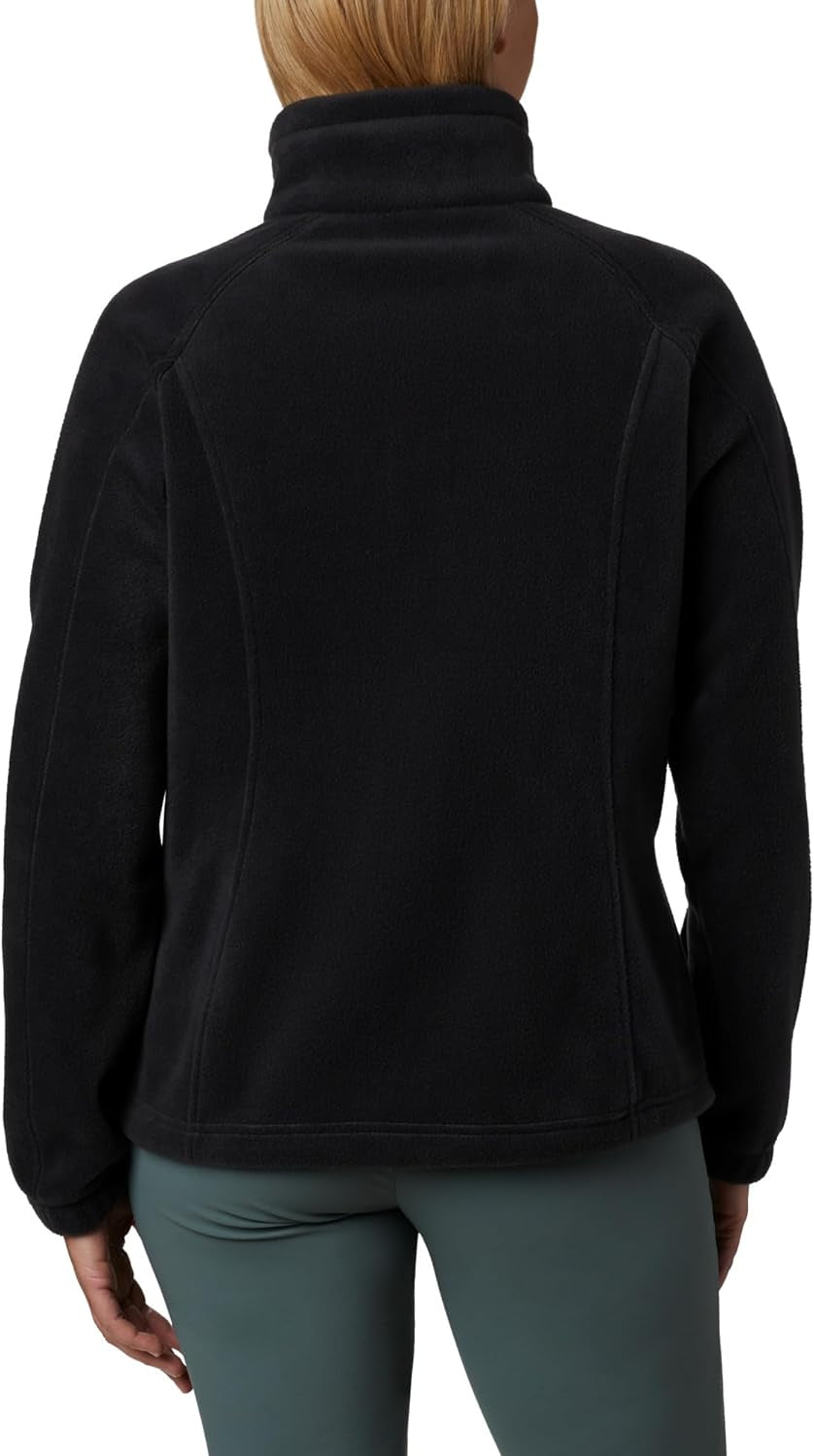 Model wearing Columbia fleece in neutral color with active fit