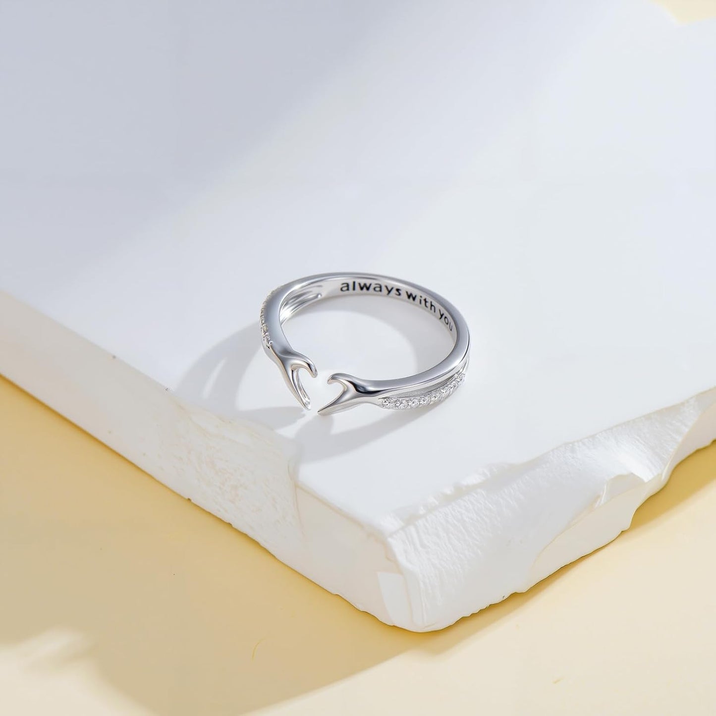 Close-up of lab grown diamond in silver hug ring setting