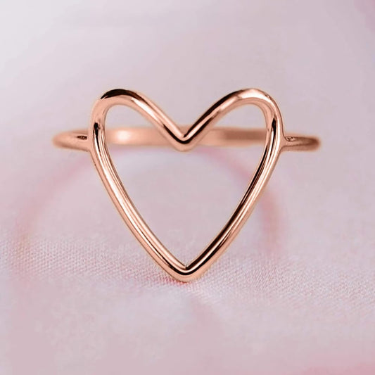 Minimalist hollow heart ring for women showing modern simple design aesthetic