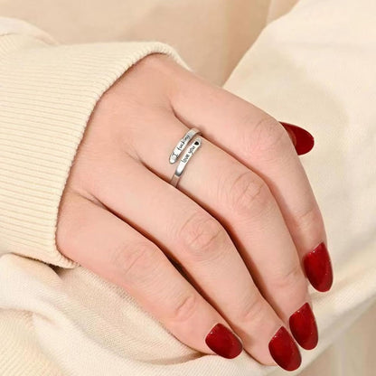 Woman wearing adjustable I Fcking Need You ring showing comfort fit