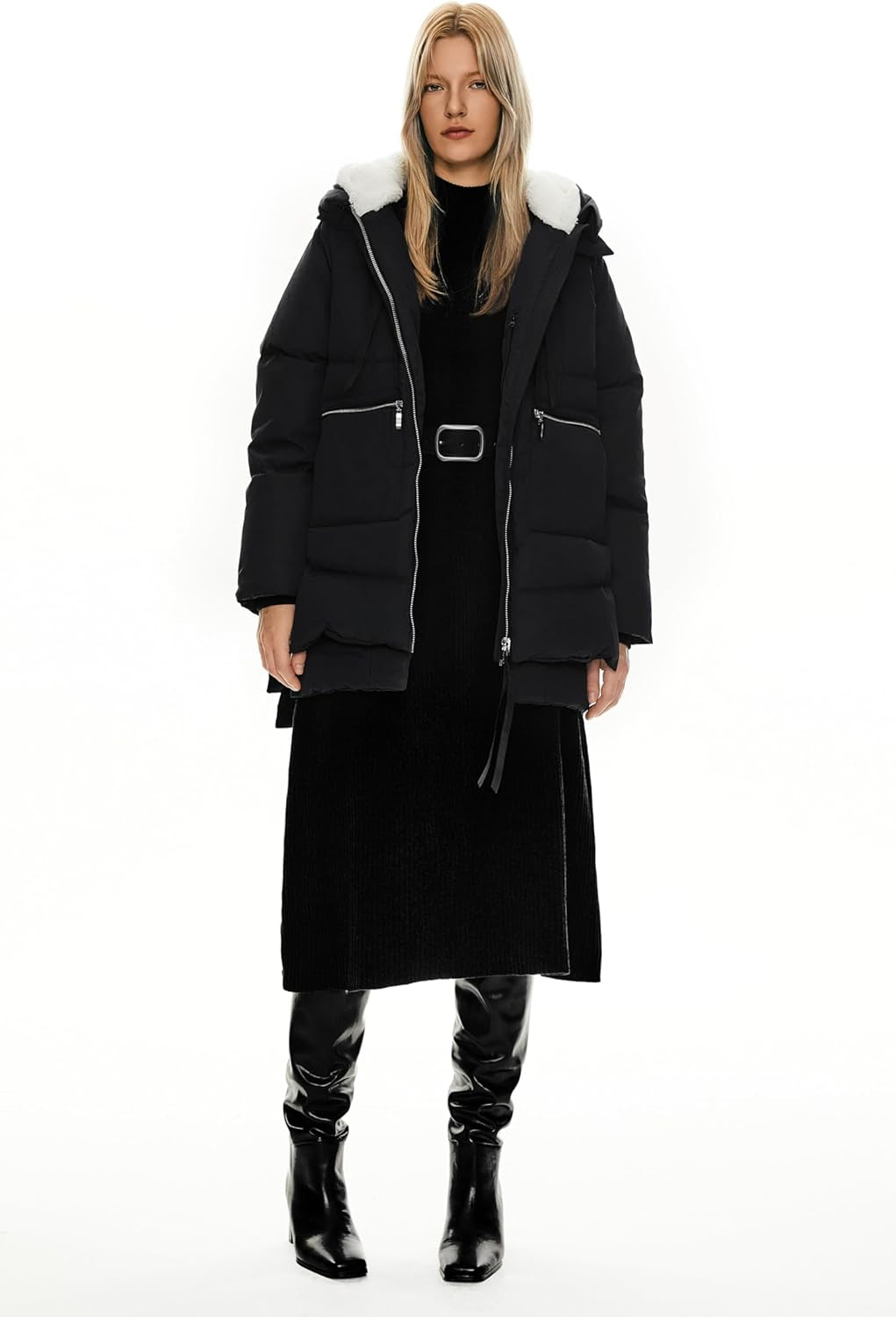 Model in fashionable oversized down parka with belt detail