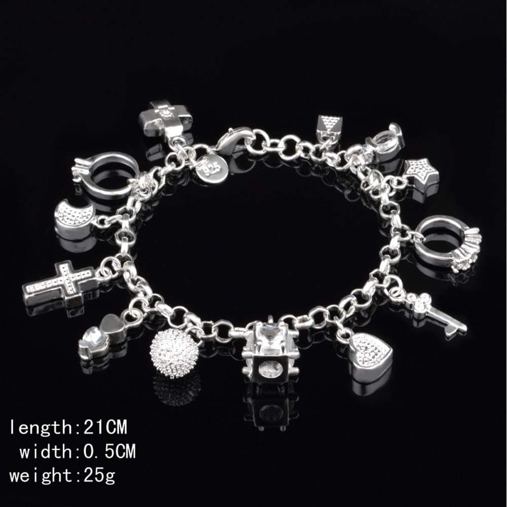 Full S925 silver thirteen piece charm bracelet laid flat showing all hanging elements