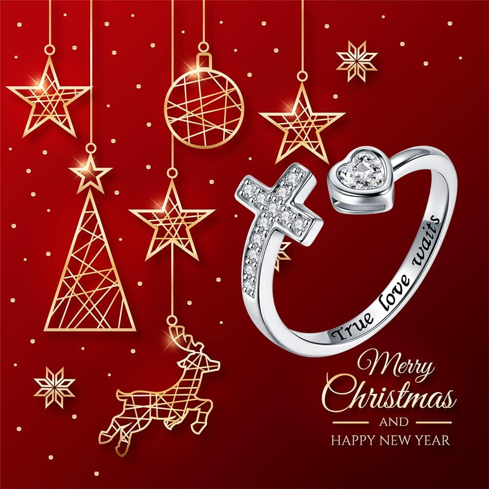 APOTIE adjustable cross ring worn on female hand close-up