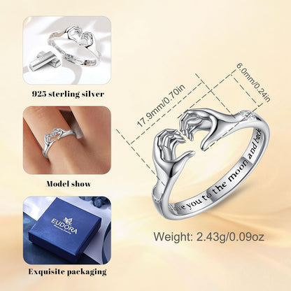 Adjustable open ring band showing how heart hug design hugs the finger