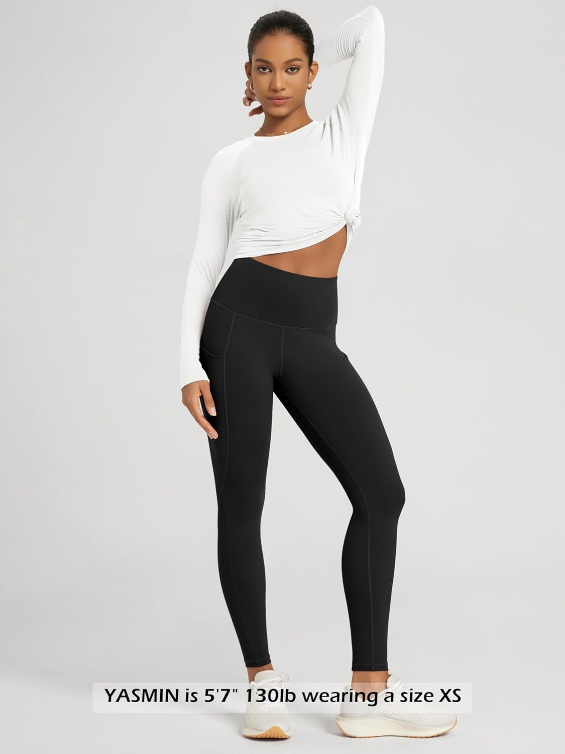 Woman wearing ODODOS high waisted leggings in yoga pose