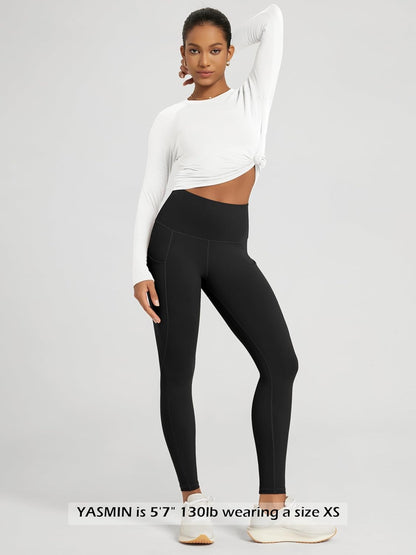 Woman wearing ODODOS high waisted leggings in yoga pose