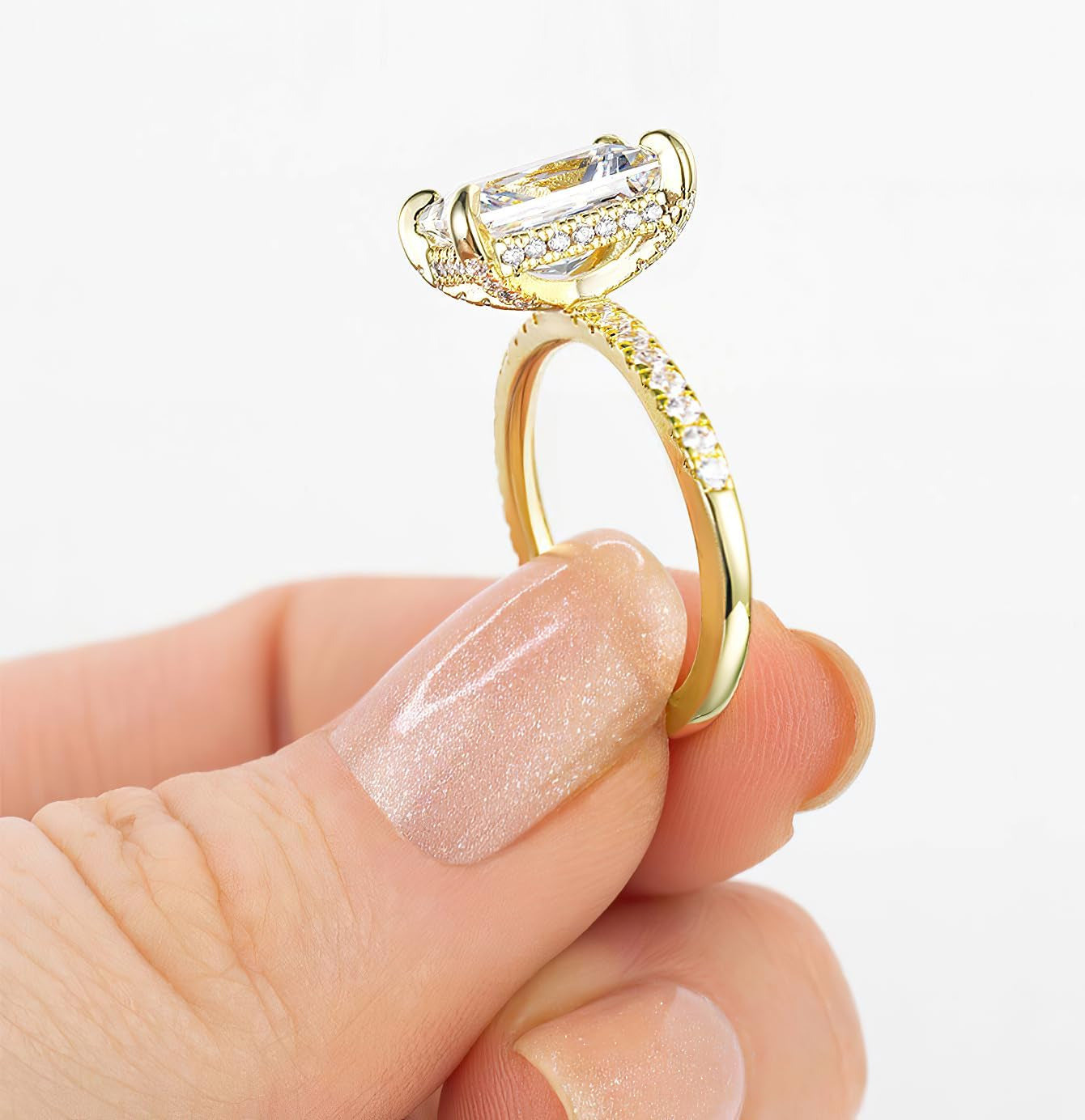 Woman wearing TIGRADE engagement ring radiant cut design