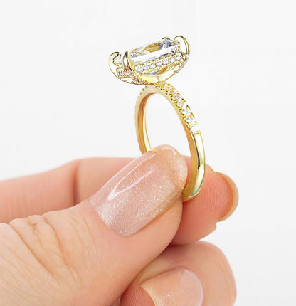Woman wearing TIGRADE engagement ring radiant cut design