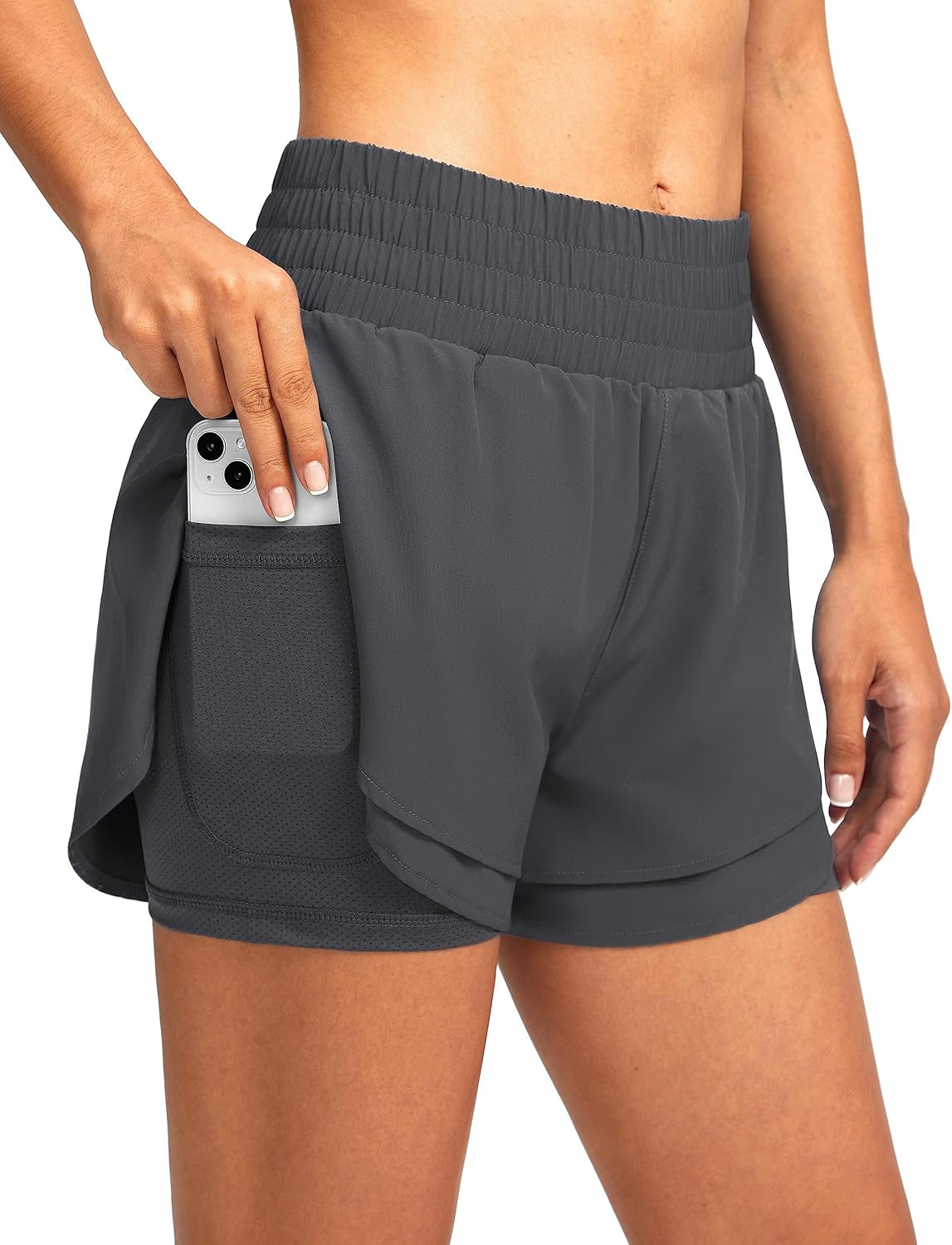 Side profile of athletic woman in Soothfeel compression running shorts for exercise