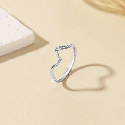 Cubic zirconia wave ring in minimalist style