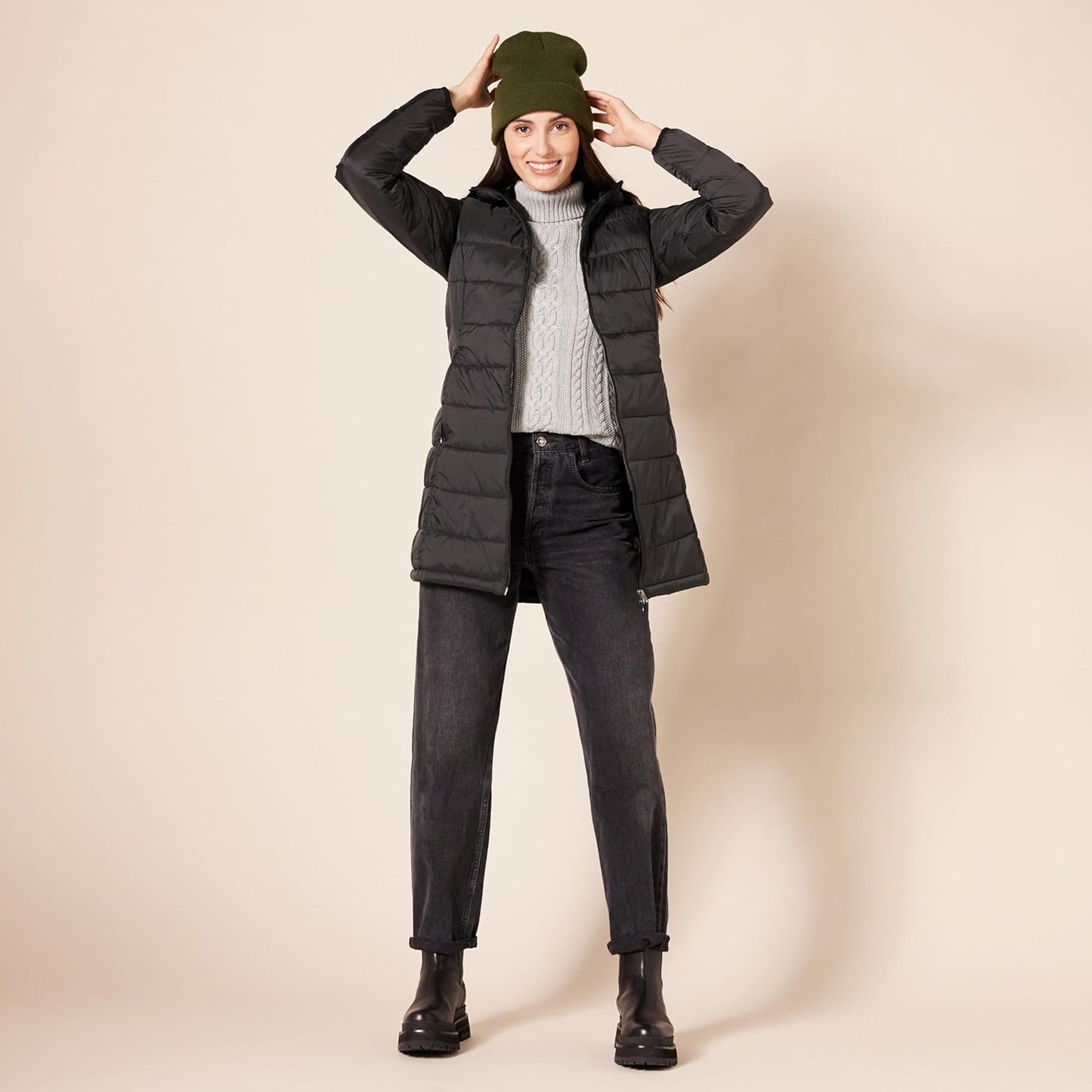 Woman in puffer coat outdoors demonstrating warmth and comfort