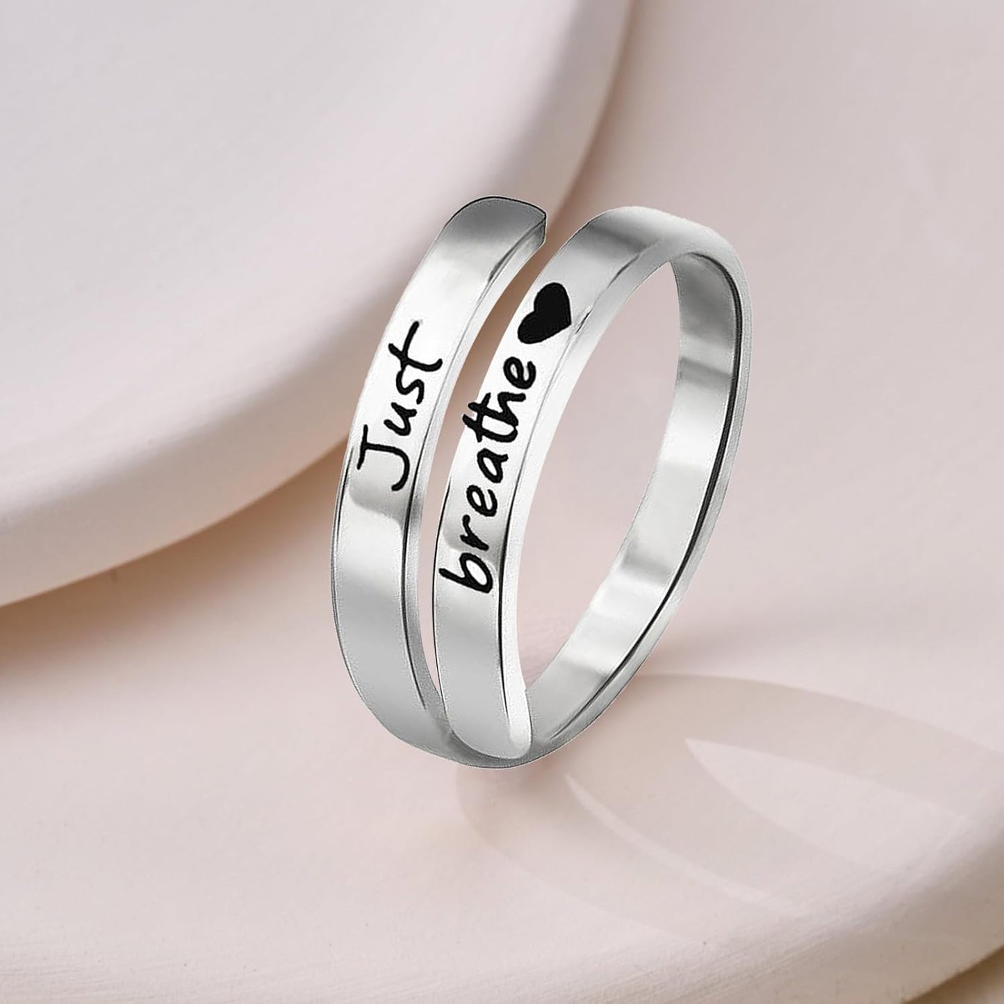 Close-up of engraved I fucking love you text on stainless steel ring