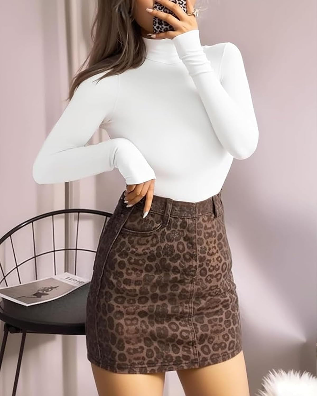 Woman wearing MANGOPOP white turtle neck bodysuit with fitted sleeves