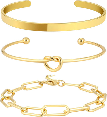 Woman wearing trendy gold plated stackable bangle set