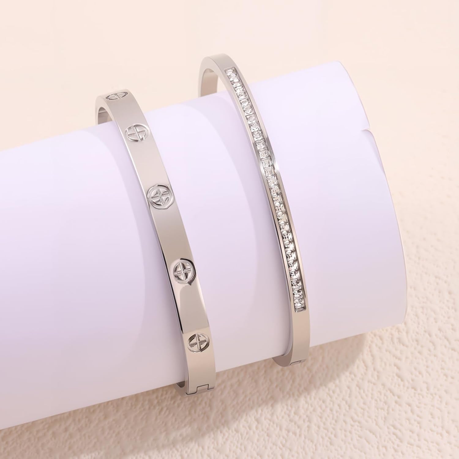 Two 18K gold plated stainless steel bangle bracelets with measurements
