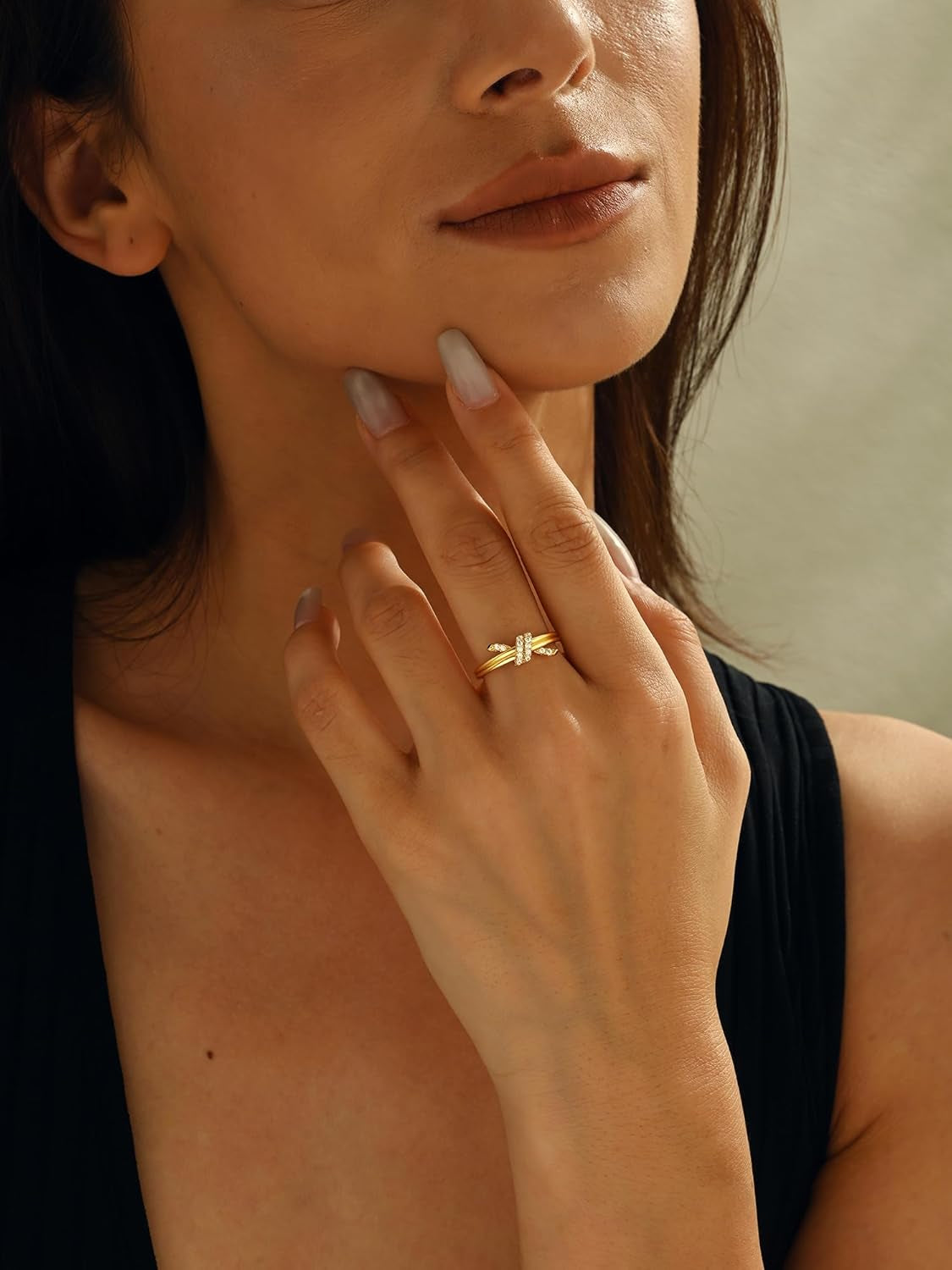 Non-tarnish gold-plated ring worn on multiple fingers