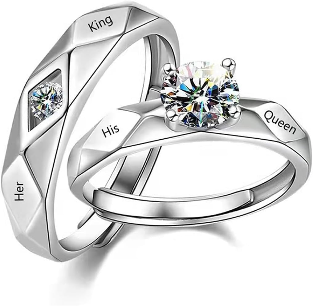 Matching silver promise rings for couples on display stand