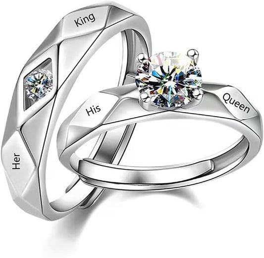 Matching silver promise rings for couples on display stand