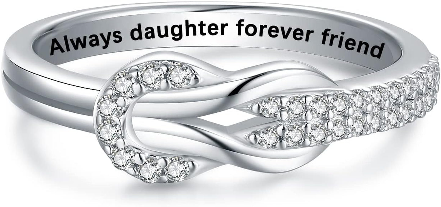 Mother daughter ring styled on woman's finger