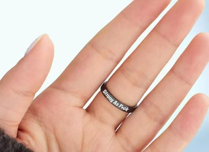 Polished black rose ring showing intricate flower design