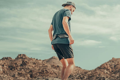 Expandable pockets on women's running belt showing flat design