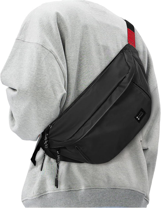 Black large crossbody fanny pack worn across woman's body
