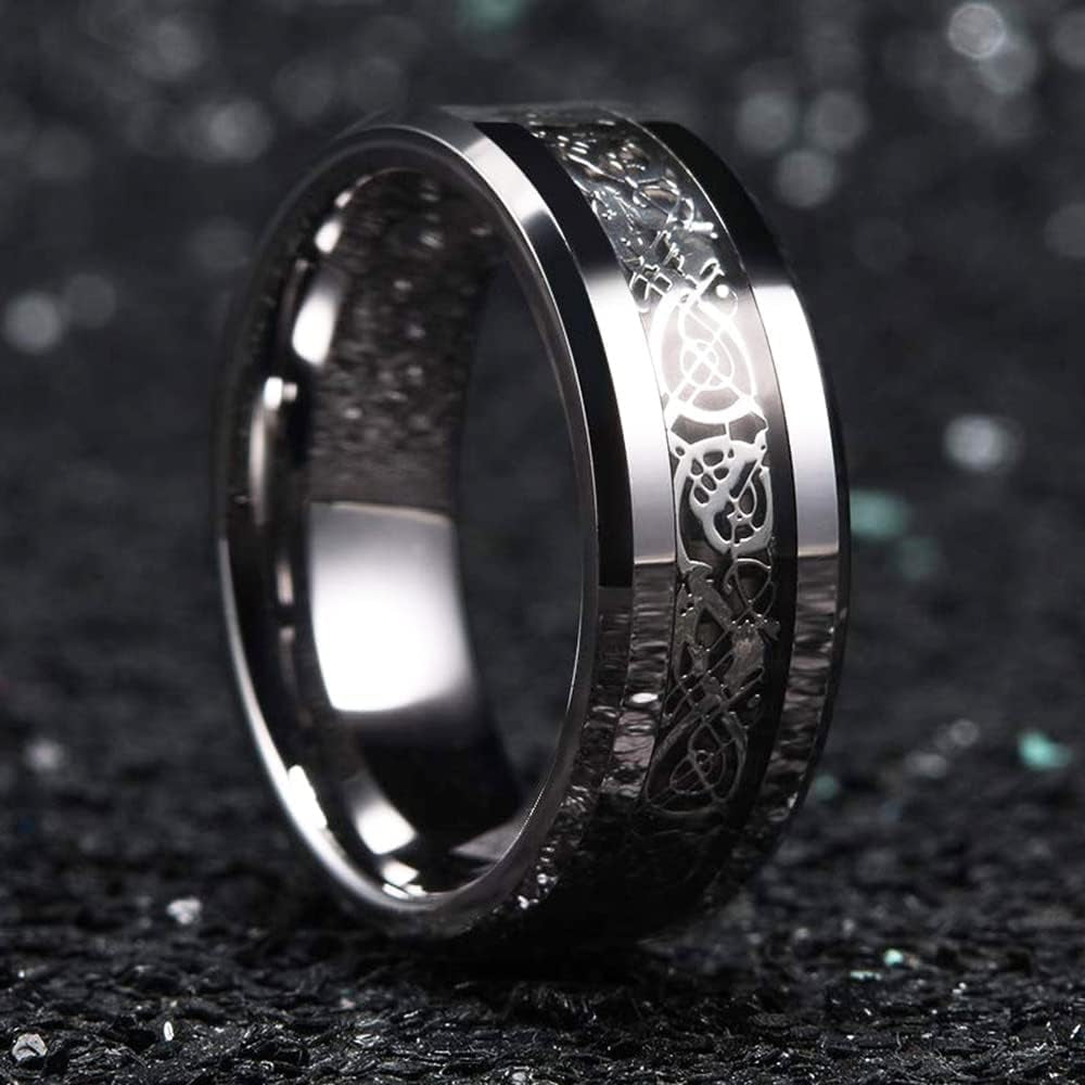 Close-up of Celtic dragon detail on silver promise ring