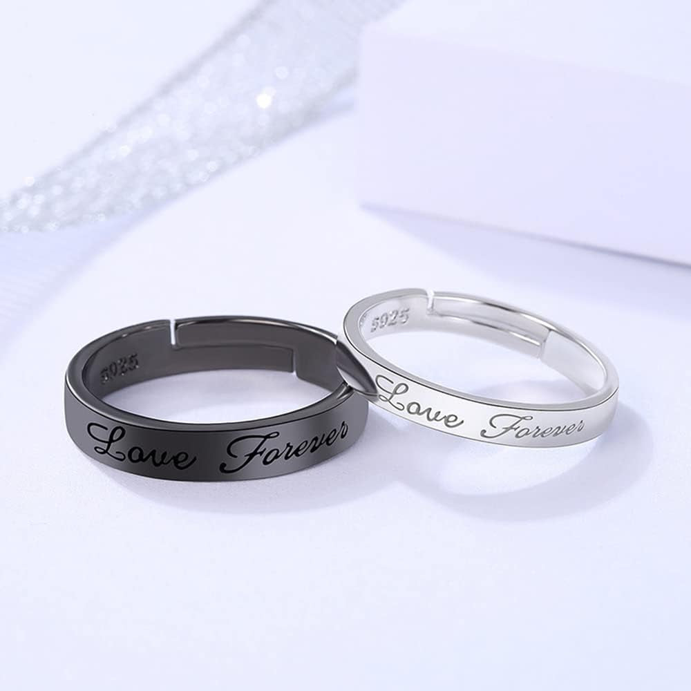 Close-up of engraved Love Forever text inside matching promise rings