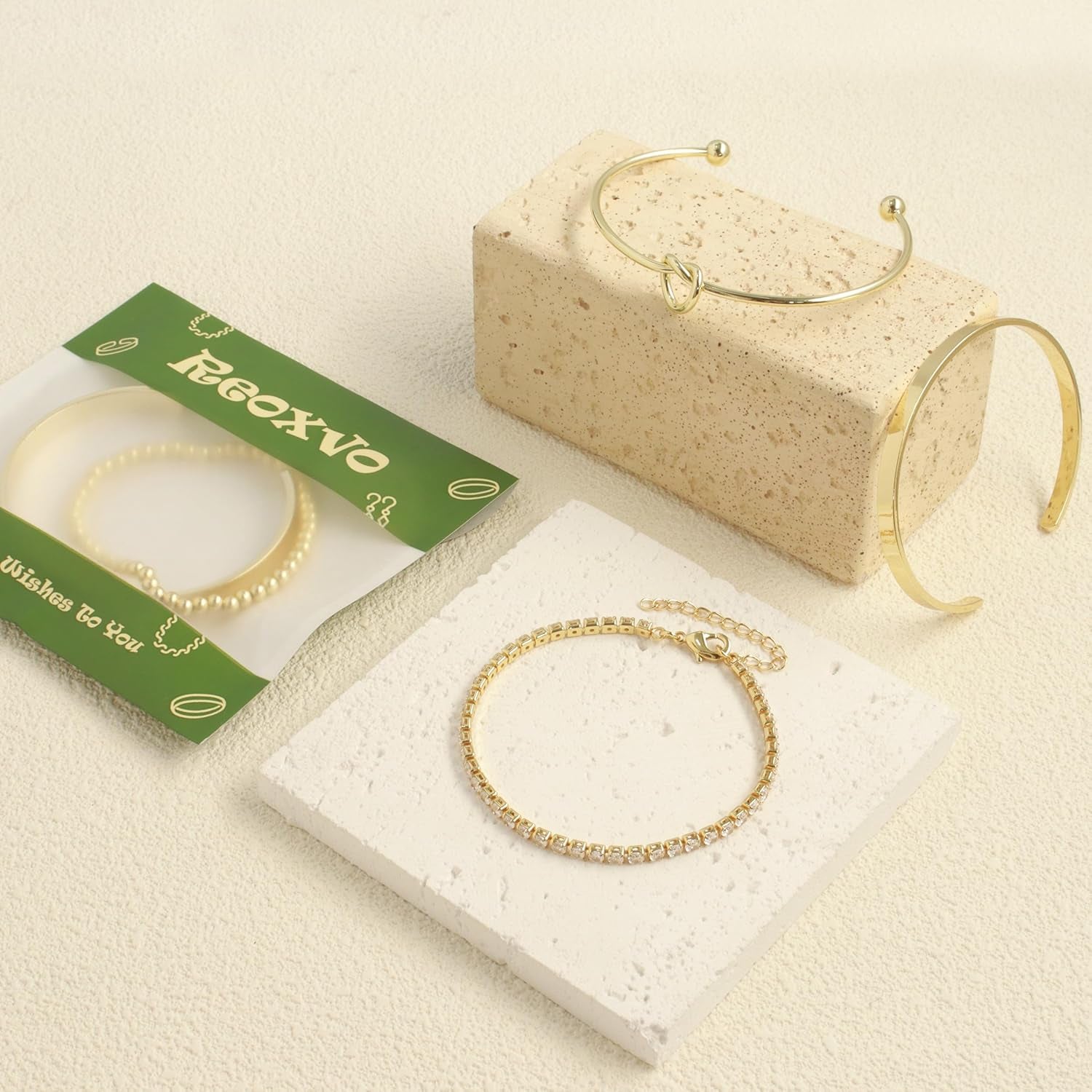 Gold bracelet set display showing stackable options for women