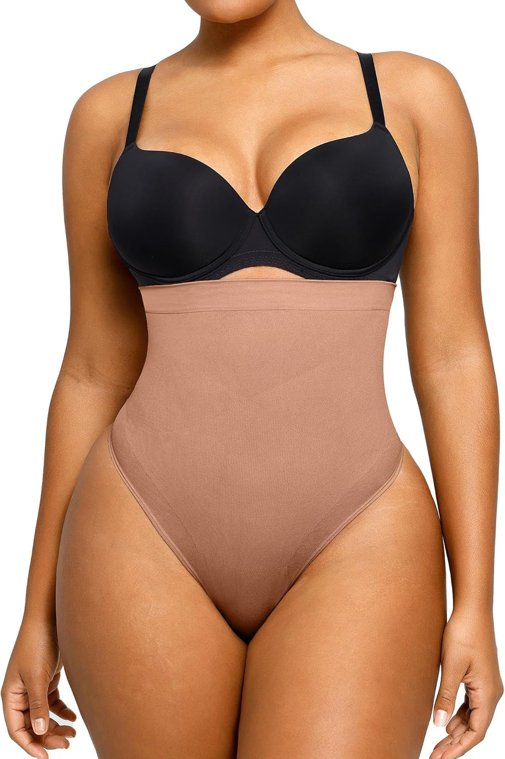 Woman demonstrating tummy control and waist slimming effects of SHAPELLX shapewear
