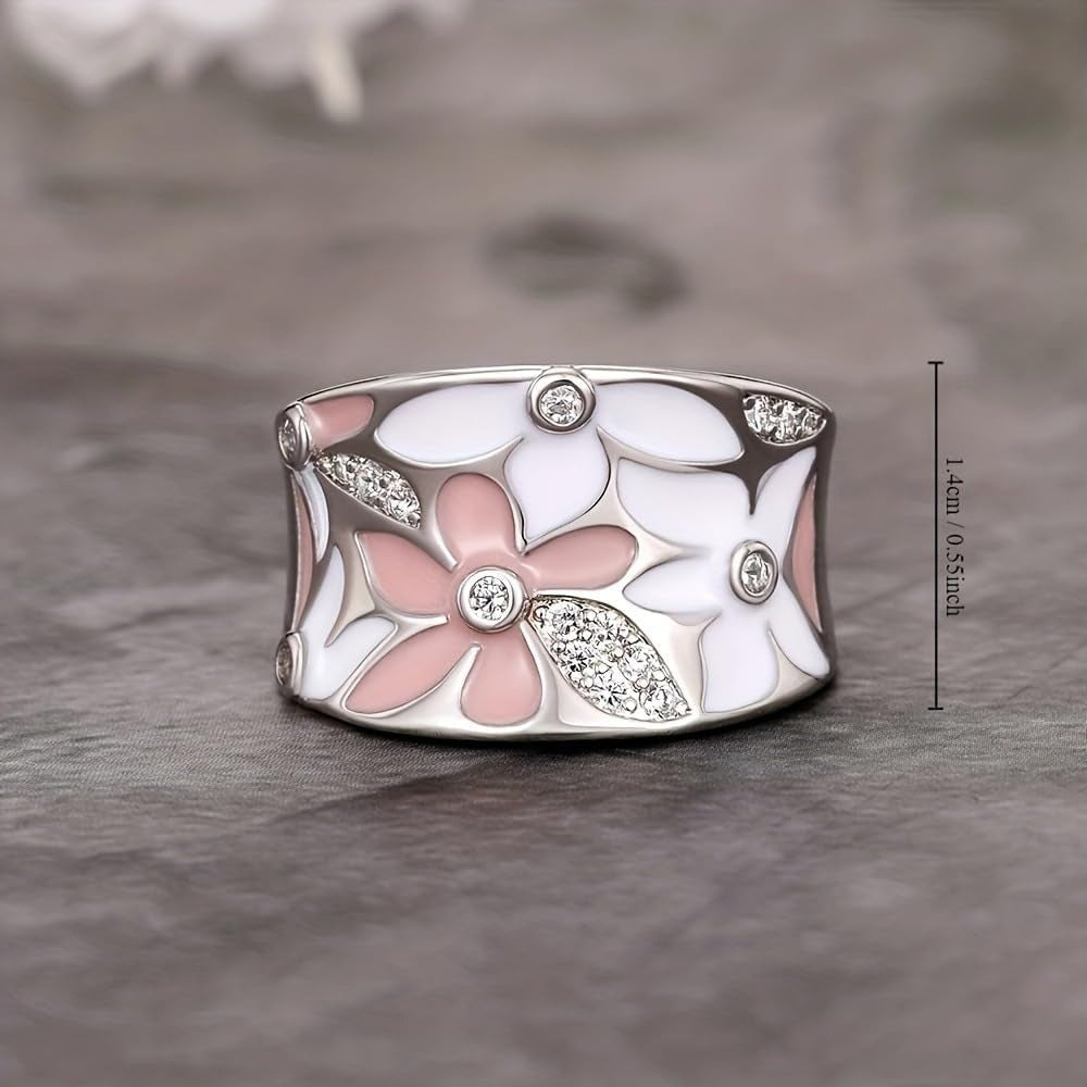 White flower ring with cubic zirconia sparkle detail