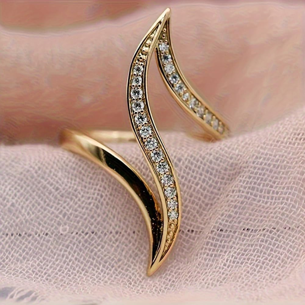 Gold plated ring displayed on velvet jewelry stand