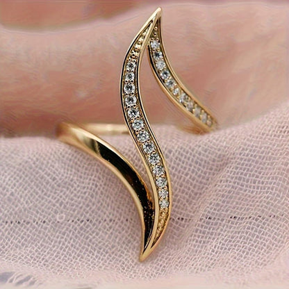 Gold plated ring displayed on velvet jewelry stand