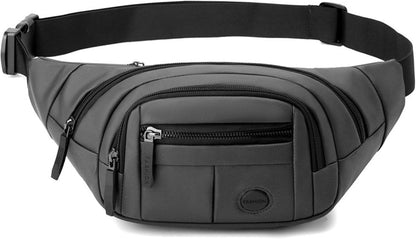 Flat lay of black fanny pack showing all compartments and features