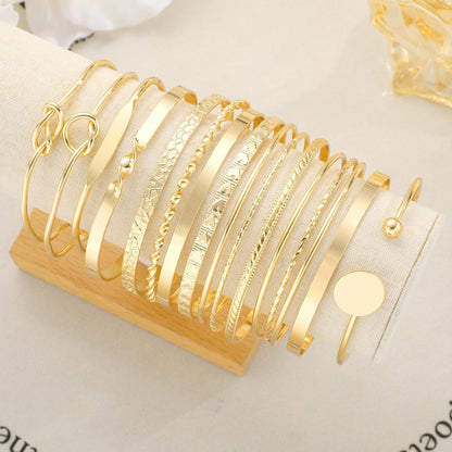 FAXHION Gold Bangle Bracelets for Women, 14 Pcs Multi Layer Stackable Bangle Set, 14K Gold Plated Textured Chunky Bracelets Boho Jewelrys Set